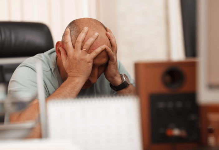 Man frustrated because he has business problems